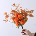 Autumn style bouquet with orange ping pong mums and eucalyptus leaves in warm tones - Burnt Orange