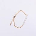 Birthstone beaded bracelet in gold finish featuring clear faceted crystals and lobster clasp - April - Diamond White