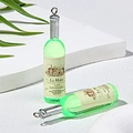 Detail of miniature green resin wine bottle charms with La Motte vintage label - Green