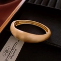 Macro detail of golden matte chunky bangle with brushed texture in premium jewelry box - Gold Matte Brushed Bangle (HB3413)