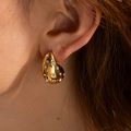 Golden oversized water drop earrings with white zircon inlays worn by a female model - Gold Waterdrop Rhinestone (A)