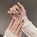 Detail of grey almond fake nails with silver metal butterfly and rhinestone chain design - By1652 Haiyanheqing / Glue Type