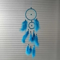 Handmade woven dream catcher featuring blue feathers and beaded rings for home wall decor - Double Ring / Blue