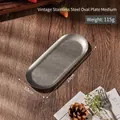 Vintage oval stainless steel tray in stone-washed matte grey finish, size 23x9.5cm - M