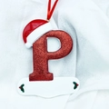 Sparkly pink letter P Christmas ornament with festive Santa hat and red hanging ribbon - Letter P