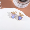 Detail of leopard head pendant with iridescent crystal and gold bow for DIY jewelry making - Purple/Gradient Cat Head
