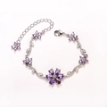 Elegant silver bracelet featuring purple pear-shaped crystal flowers and zircon leaves - Purple-White Gold