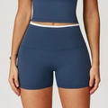 Pantaloncini da yoga blu navy a vita alta con cintura a contrasto bianca e vestibilità elasticizzata - S / Blu Navy