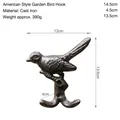Vintage Vogel Wandhaken aus dunkelgrauem Gusseisen mit Doppelhaken für Deko - Vogel Doppelhaak 7611