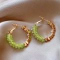 Macro detail of gold and green crystal beaded hoop earrings on silk background - 42# Green Crushed Gold Plated Earrings