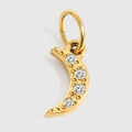 Macro shot of gold crescent moon pendant featuring four inlaid round clear zircon stones - Crescent Moon