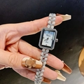 Elegant square pearl shell dial watch with sparkling diamonds and silver strap - Silver