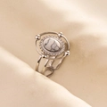 Detailed macro view of vintage silver bohemian ring with oval white turquoise stone inlay - Silver Base White Turquoise Texture