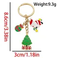 Christmas keychain with Santa Claus and tree pendant in gold and red enamel finish - ER1773-Gift Tree Santa Claus Keychain