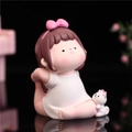 Resin cartoon girl figurine in yoga pose with white kitten on reflective surface - B105-A Leg Stretch Back