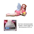Pink fairy resin figurine with blue wings holding flowers, 31g weight and 6cm size display - Prone Position Flower Fairy