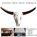 Resin cow skull wall hanging with white skull and dark brown horns tribal decor - Cow Skull Wall Hanging