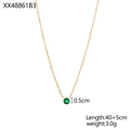Detail of gold necklace featuring a 0.5cm round green gemstone pendant in claw setting - May-Green