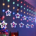 Christmas LED curtain lights with stars and snowflake pendants featuring Santa and snowmen - USB Remote Control / Snowflake Star Ring