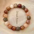 Multicolor beaded bracelet with vintage dry rose and cream tones in a circular layout - Brown