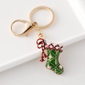 Porte-clés botte de Noël en émail vert foncé orné de strass blancs brillants - Chaussette de Noël