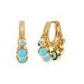 Detail of gold hoop earrings with light blue round charms against a white background - Blue Turquoise