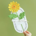 Hand-knitted sunflower bouquet with yellow petals and green leaves in elegant packaging - Gerbera - Yellow