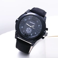 All-black men's quartz fashion watch with matte finish and leather strap on white stand - Black
