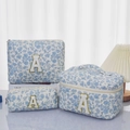 Blue floral quilted cotton 3-piece makeup bag set with letter A patch detail - White Background With Orchid And Letter A