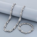 Detalle del conjunto de collar y pulsera de cadena bizantina en acero inoxidable plateado - Pulsera 21.5cm / Color Acero