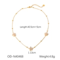 Detailed macro view of 18K gold daisy flower necklace with clear zircon inlay - Flower Pendant Style (OD-N40468)