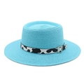 Detail of light blue straw boater hat with cow print ribbon and silver buckle decoration - M (56-58cm) / Lake Blue