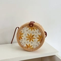 Handmade round rattan bag with shell inlay and floral design in natural beige and white - Yellow Floral