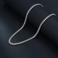 Elegant multi-layered silver diamond tassel necklace set displayed on a black background - Rhinestone Short Necklace
