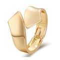 Macro detail of gold asymmetric double-layered pearl bracelet with polished finish - Asymmetric Streamline Open (SZYS-016HJ-J)