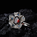 Macro shot of S925 silver floral ring with garnet and tiny colorful gemstones - Natural Garnet Flower Ring LR337