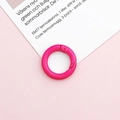 Macro shot of bright pink 20mm round spring ring buckle for DIY accessory and keychains - Rose Red