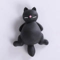 Cute black cat squishy stress relief toy with pink nose and minimalist cartoon design - Naughty Black Cat
