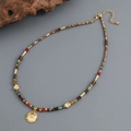 Bohemian handmade necklace featuring tiger eye beads and a golden sun pendant - Sun Face Pendant Multicolor Beaded Style (XL-816J)