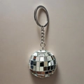 Mirror disco ball keychain with silver metal chain on a clean beige background - 2cm Silver / Keychain Style Bulk