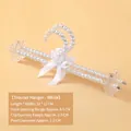 White pearl trousers hanger with elegant ribbon bow and clips for clothing display - Pants Rack (Adult) / White
