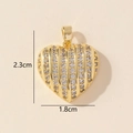 Macro view of gold heart pendant with vertical stripes and zircon crystals, 2.3cm height - 0228-29/Gold Striped Zirconia