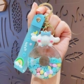 Cute blue Cinnamoroll acrylic donut oil keychain with silicone wristband and rainbow charm - New Sanrio Donut - Cinnamoroll