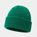 Macro detail of the dark green ribbed knit beanie showing high-quality fabric texture - One Size / Emerald Green