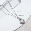 Collier avec pendentif goutte d'eau orné de zircons, finition argentée, chaîne 45cm - Blanc