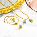 Bohemian gold stainless steel jewelry set with turquoise stones on white texture - Four-Piece Set