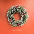 Christmas wreath with artificial pine needles red berries and cones on orange background - Pine Needle Red Berry Wreath 45cm