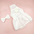 Detailed view of white floral pet dress with 3D flowers, lace hem, and matching bow - XS / Chanel Style White Formal Gown with Headpiece