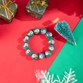 Bracciale natalizio con perline di resina verde con motivi di Babbo Natale ed elastico - Verde / Stampa Babbo Natale
