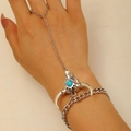 Ethnic bull skull ring bracelet with turquoise bead in vintage silver finish on hand - Silver Cow Skull Finger Bracelet (23 Silver 1018)
